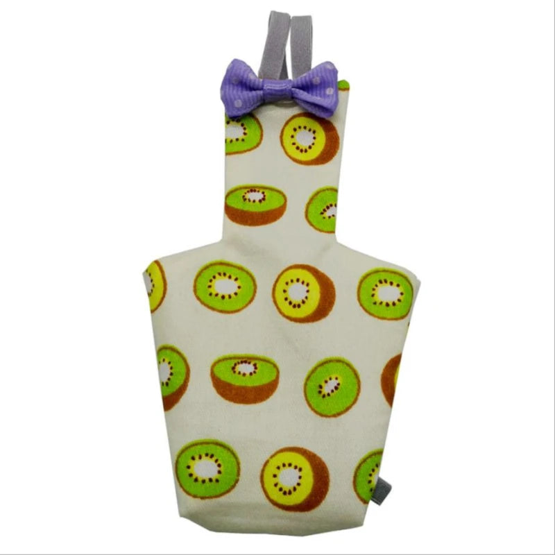 Pinafore with kiwi pattern and purple bow on a white background