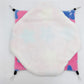 Round white plushie with pink and blue accents on a white background