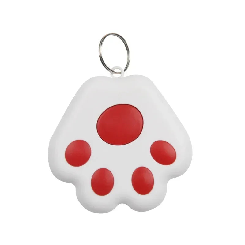 White keychain in the shape of a paw with red accents on a white background