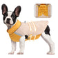 Dog wearing a yellow and beige quilted jacket with a close-up inset of the jacket's interior.