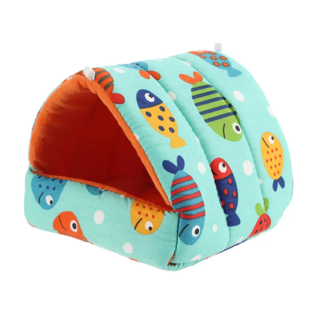 Colorful fish-patterned pet tent on a white background