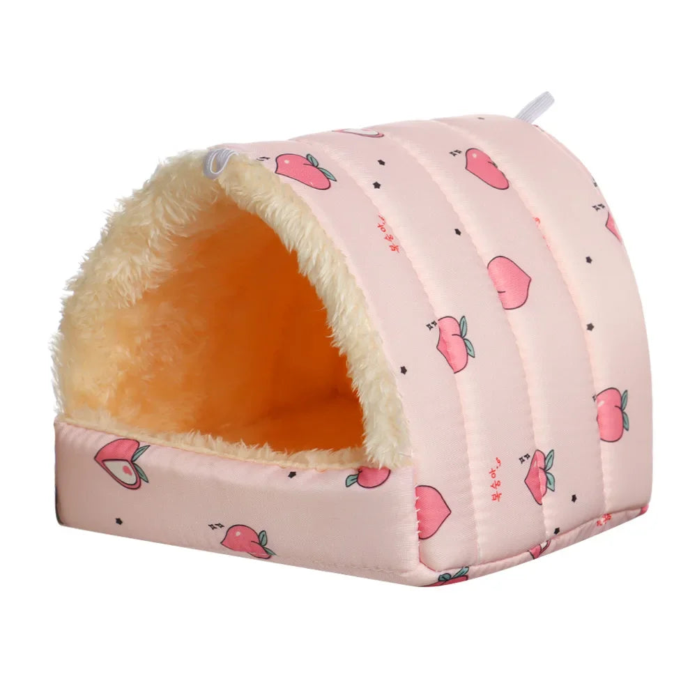 Pink pet bed with heart pattern on a white background