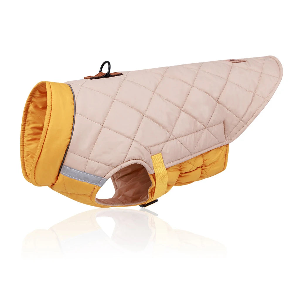 Quilted dog coat with beige body and yellow trim on a white background