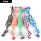 Four colorful rope toys on a white background