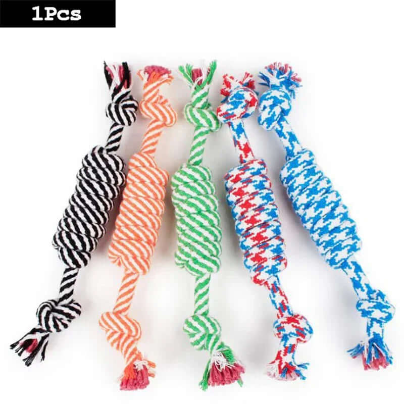 Four colorful rope toys on a white background