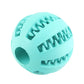 Teal rubber ball with textured surface on a white background
