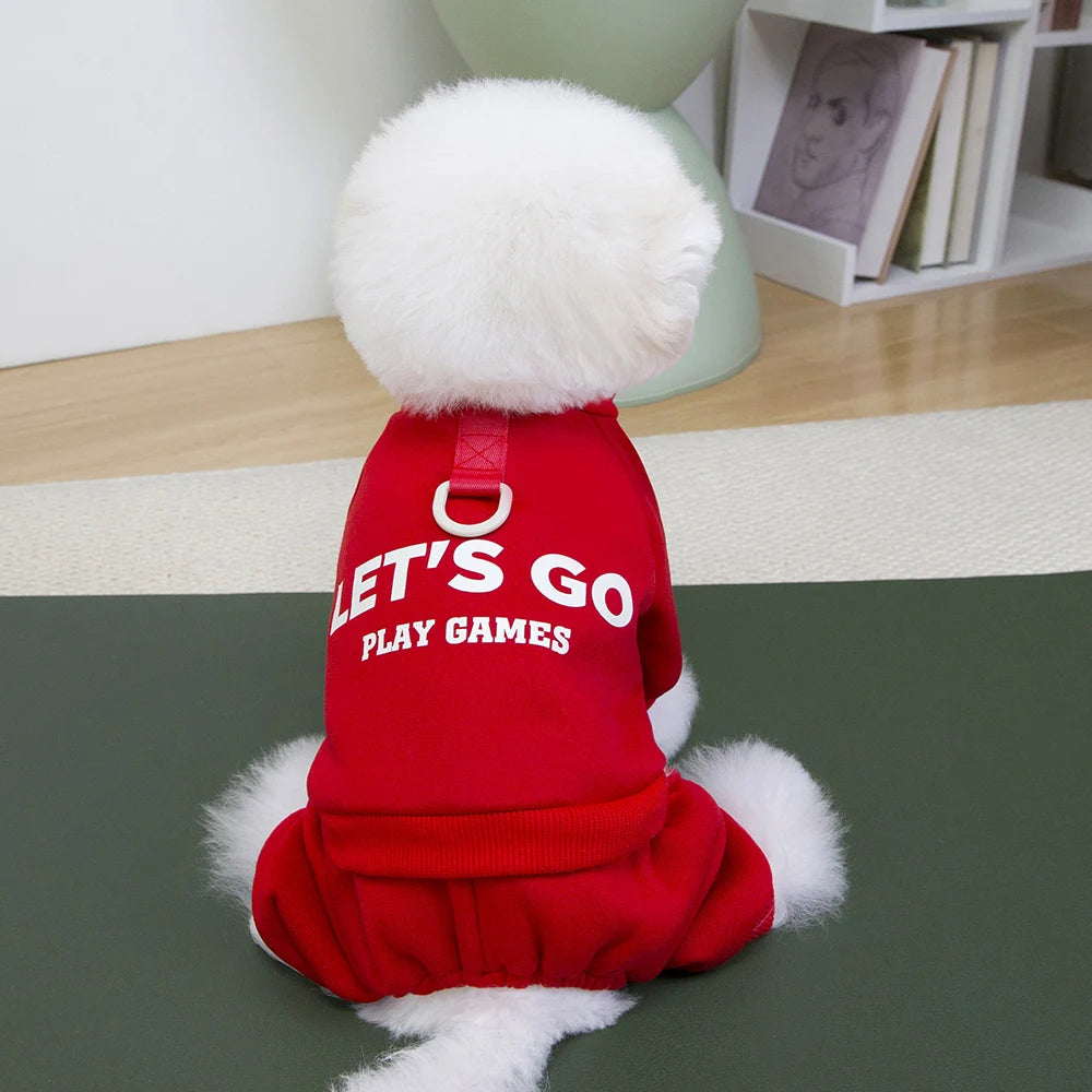 Red pet outfit with 'LET'S GO PLAY GAMES' text on a green floor.