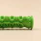 Green textured roller on a beige background