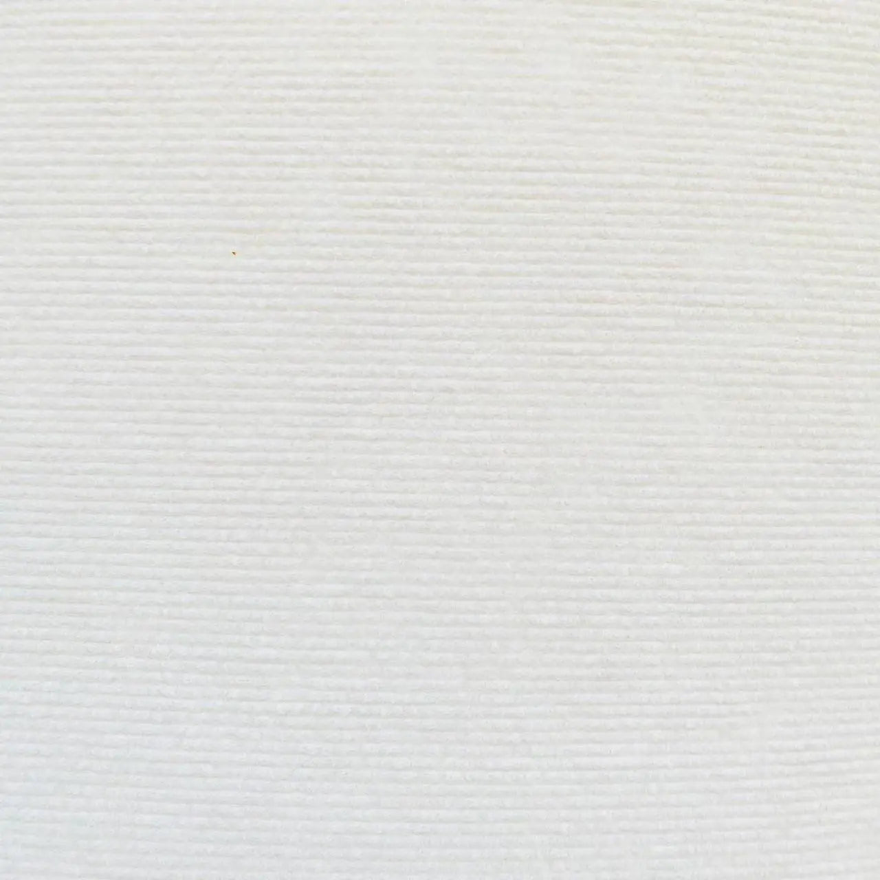 Close-up of a textured white surface with horizontal lines