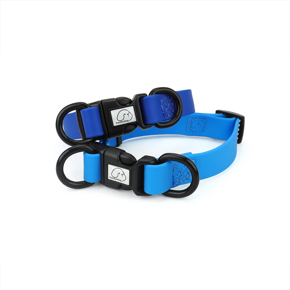 Blue dog collar with black hardware on a white background