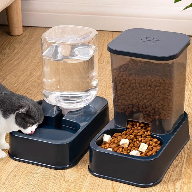 Pet feeding station with water dispenser and food container on a wooden floor.