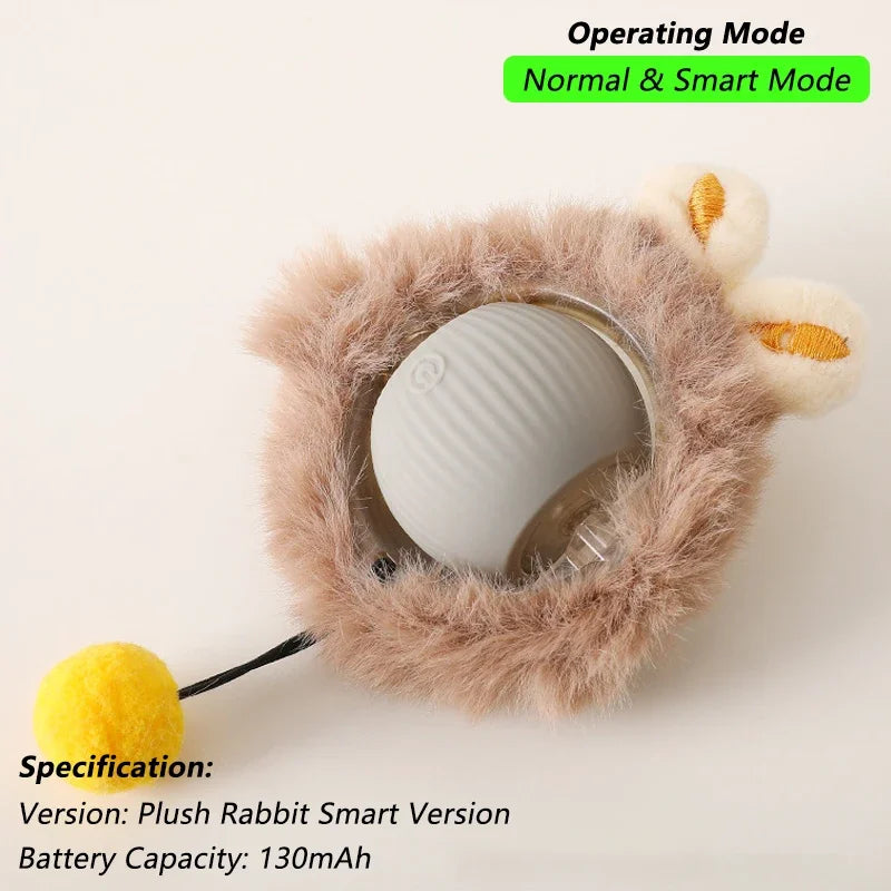Plush rabbit-shaped electronic device with a white ball inside, on a light background.
