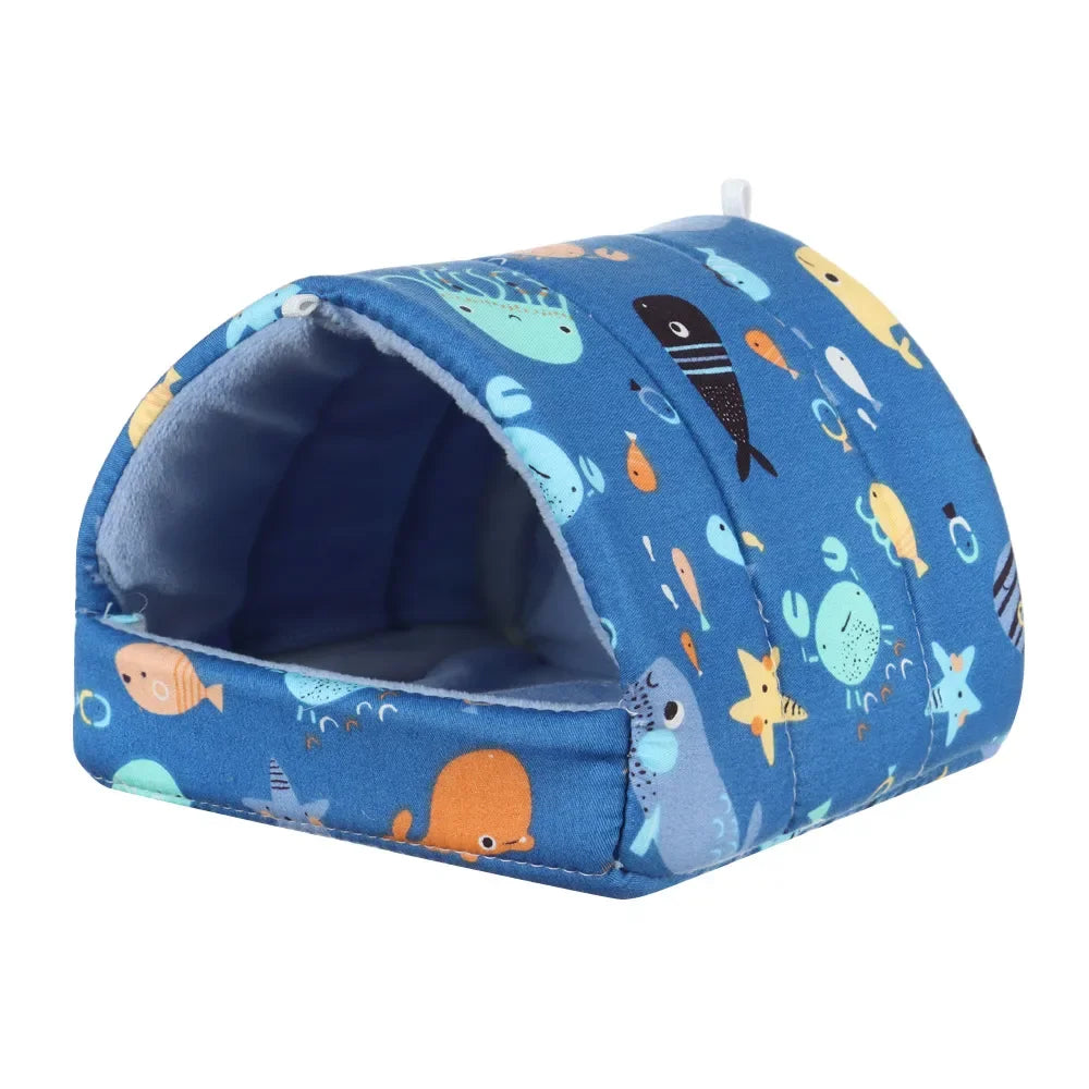Blue pet bed with sea animal pattern on a white background