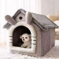 Dog peeking out from a gray pet house with a fluffy interior