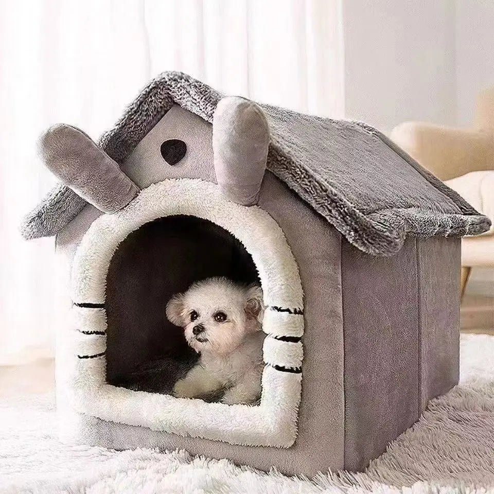 Dog peeking out from a gray pet house with a fluffy interior