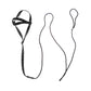 Black headband and two black hair ties on a white background