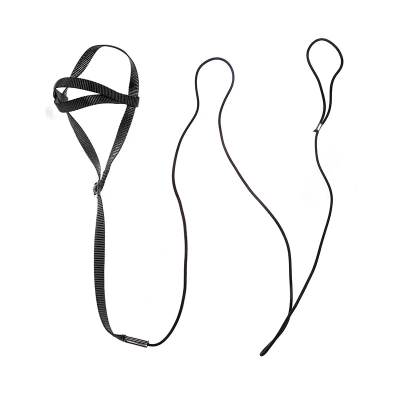 Black headband and two black hair ties on a white background