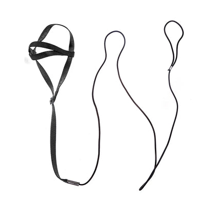 Black headband and two black hair ties on a white background