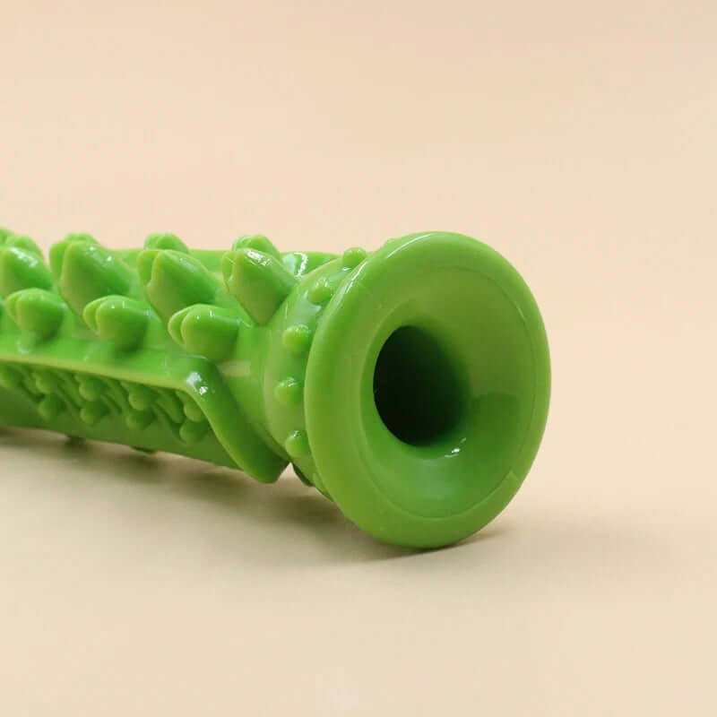 Green textured roller on a beige background