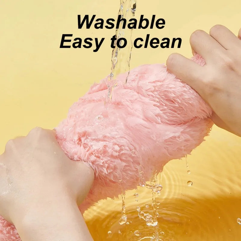 Pink fluffy object being washed with water, text 'Washable Easy to clean' on a yellow background