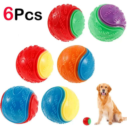 Set of six colorful dog toys with a dog sitting next to them.