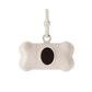 Bone-shaped pet toy with a black center and silver ring on a white background