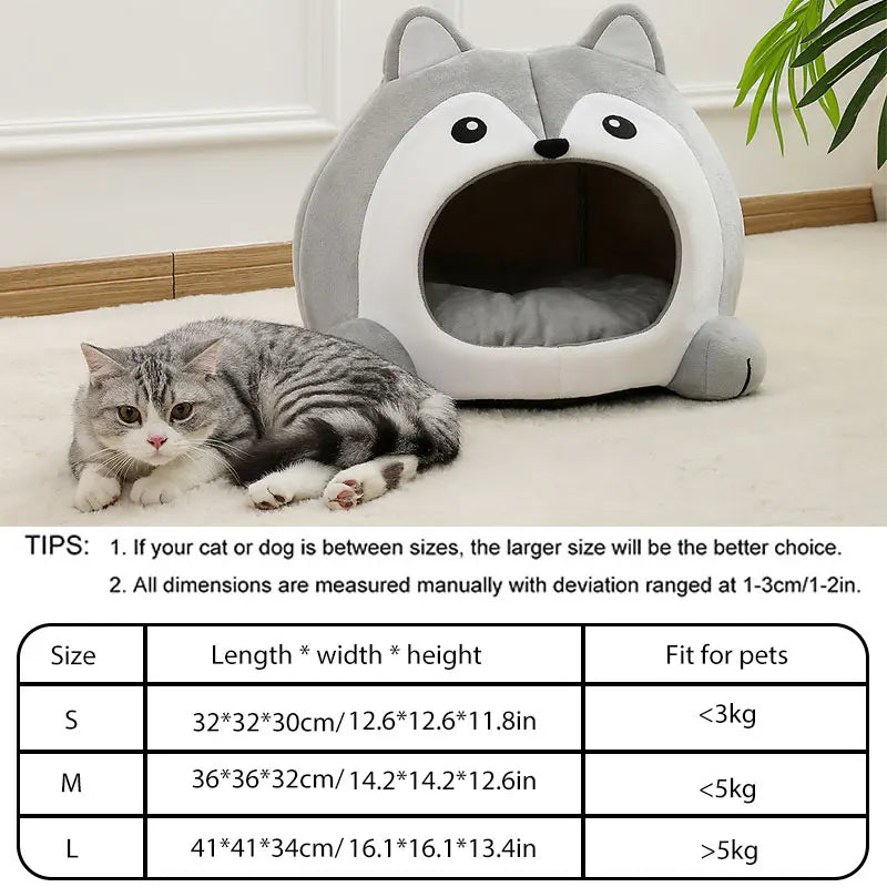 Cat lying next to a gray and white pet bed shaped like a wolf, with product dimensions table below.
