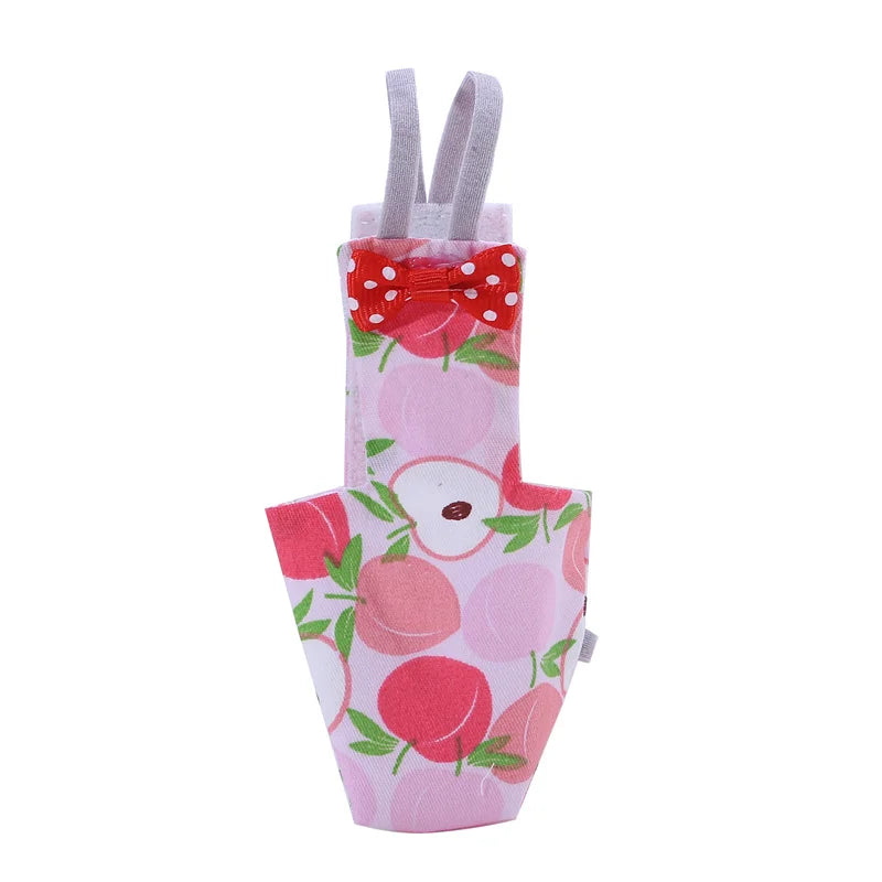 Pink glove with apple design and bow on a white background