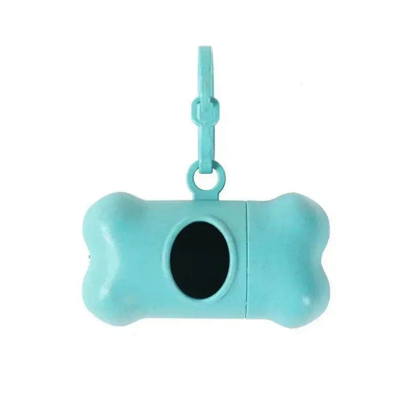 Turquoise bone-shaped pet toy with a black center on a white background