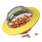 Pet food container with yellow lid and transparent dome, filled with kibble.