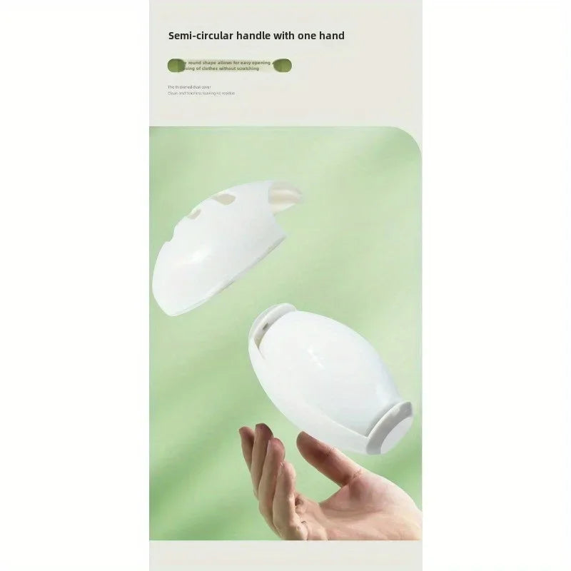 White semi-circular handle held by a hand against a green background with text.