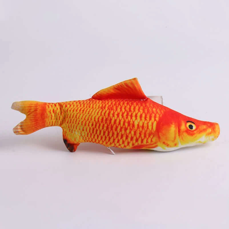 Toy fish with orange and yellow colors on a white background