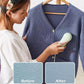 Woman using a handheld device on a blue sweater with 'Before' and 'After' color swatches.
