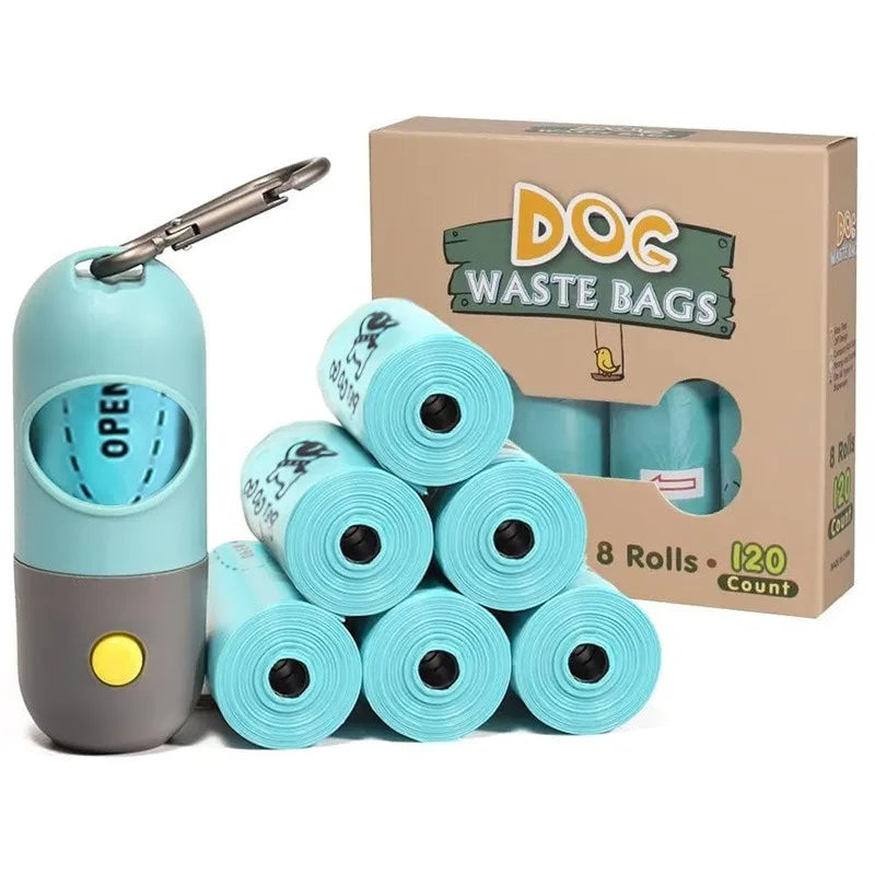Dog waste bag dispenser with rolls of bags and packaging on a white background