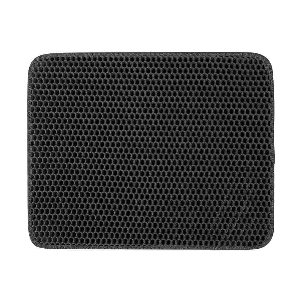 Black honeycomb patterned mat on a white background