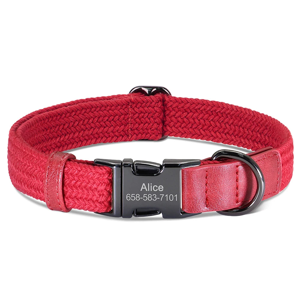 Red dog collar with a black engraved nameplate on a white background