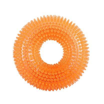 Orange silicone ring with textured surface on a white background