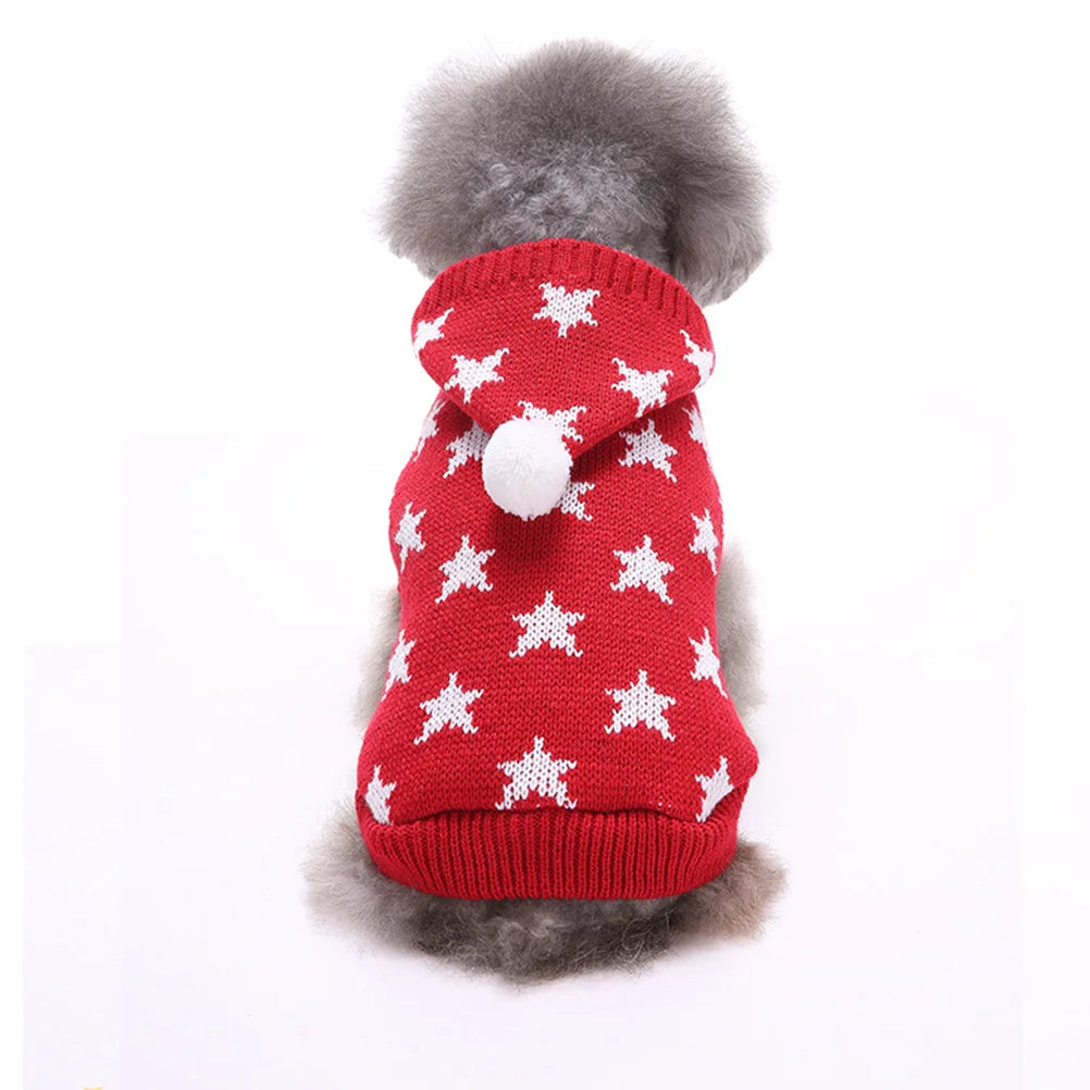 Red dog sweater with white star patterns and a white pom-pom on a white background