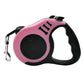 Pink and black retractable dog leash on a white background