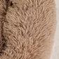 Close-up of a brown, fluffy surface