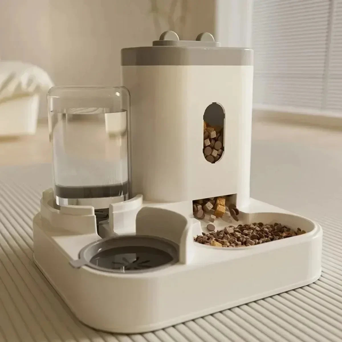 Pet feeder and water dispenser on a wooden floor