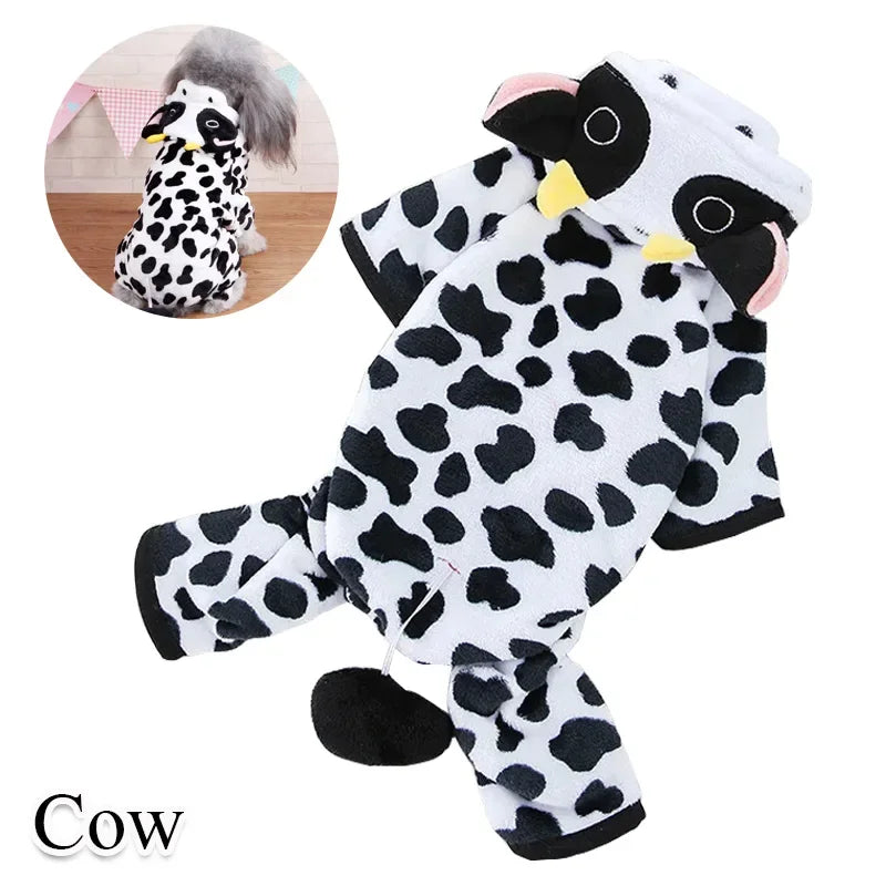 Cow-themed baby onesie with a hood on a white background