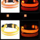 Collar with LED lights in orange, red, and yellow on a black background