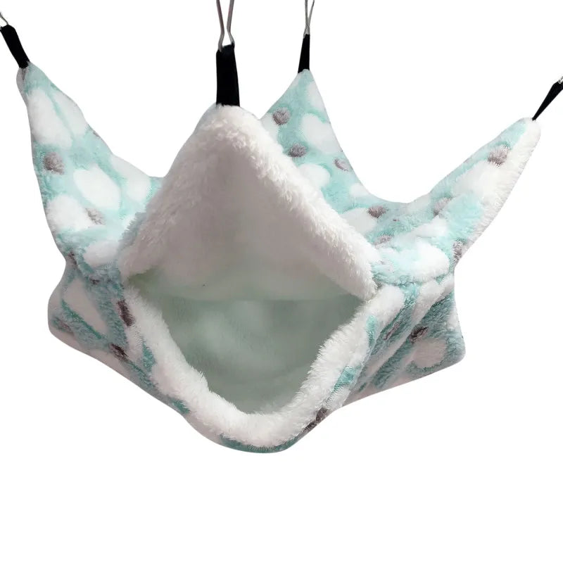 Pet hammock with white interior and blue exterior on a white background