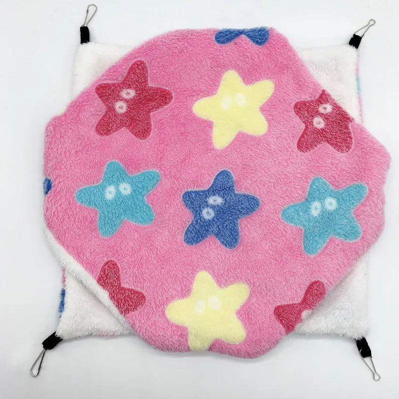 Pink hexagonal mat with star patterns on a white background