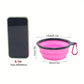 Pink collapsible dog bowl with measurements and a smartphone for size reference on a white background