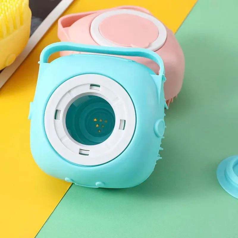 Colorful baby bottle with a pink top on a multicolored background