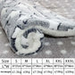 Roll of gray and white fleece blanket with size chart below