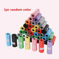 Assorted colored rolls of plastic bags on a white background with text '1pc random color'.