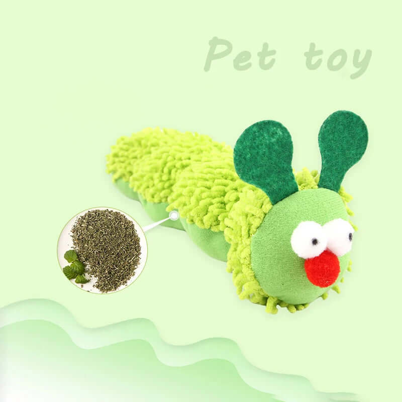 Green and yellow caterpillar-shaped pet toy with a red nose on a light green background